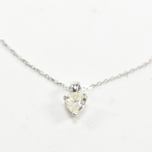 230 - A 18ct white gold and diamond pendant necklace. The necklace strung with a pear brilliant cut diamon... 