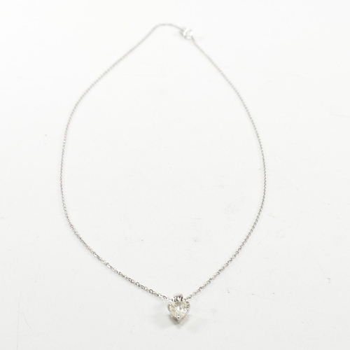 230 - A 18ct white gold and diamond pendant necklace. The necklace strung with a pear brilliant cut diamon... 