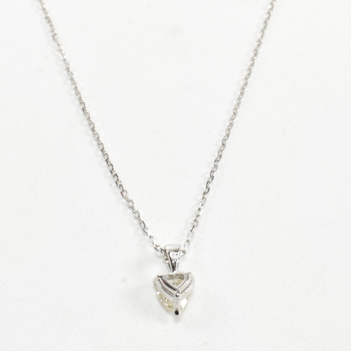 230 - A 18ct white gold and diamond pendant necklace. The necklace strung with a pear brilliant cut diamon... 