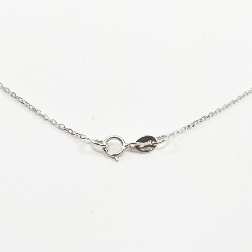 230 - A 18ct white gold and diamond pendant necklace. The necklace strung with a pear brilliant cut diamon... 