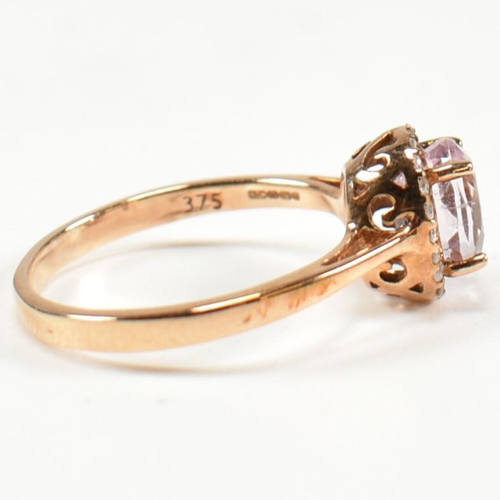 231 - A hallmarked 9ct gold kunzite and diamond cluster ring. The ring set with a four claw set oval cut k... 