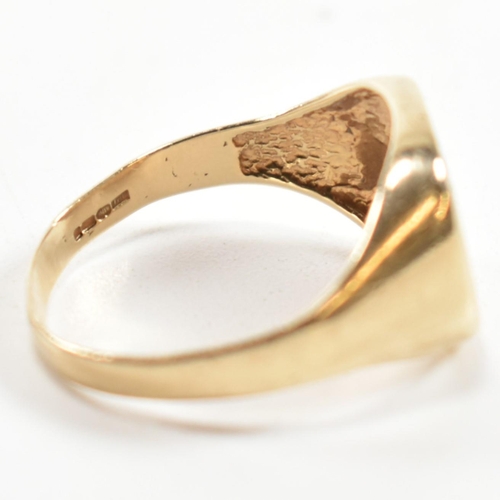 242 - A hallmarked 9ct gold and diamond engraved signet ring. The signet ring having a half engraved squar... 