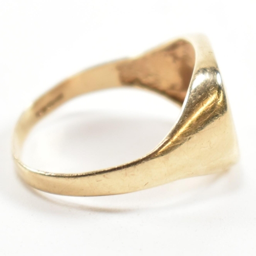 242 - A hallmarked 9ct gold and diamond engraved signet ring. The signet ring having a half engraved squar... 