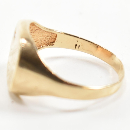 242 - A hallmarked 9ct gold and diamond engraved signet ring. The signet ring having a half engraved squar... 