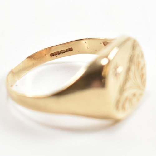 242 - A hallmarked 9ct gold and diamond engraved signet ring. The signet ring having a half engraved squar... 