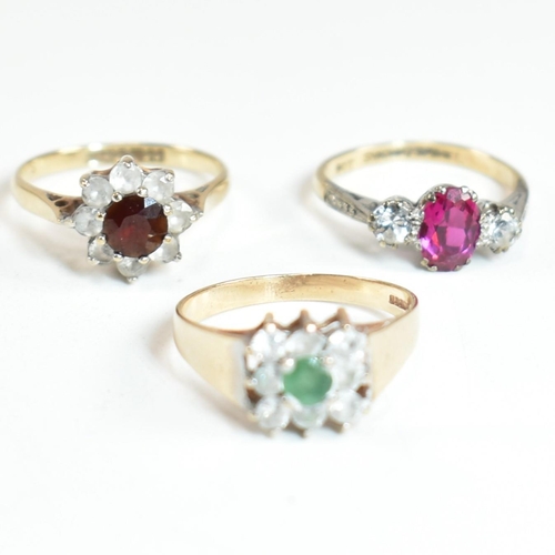 247 - Three 9ct gold and gem set rings. The rings to include a hallmarked 9ct gold, garnet and CZ cluster ... 