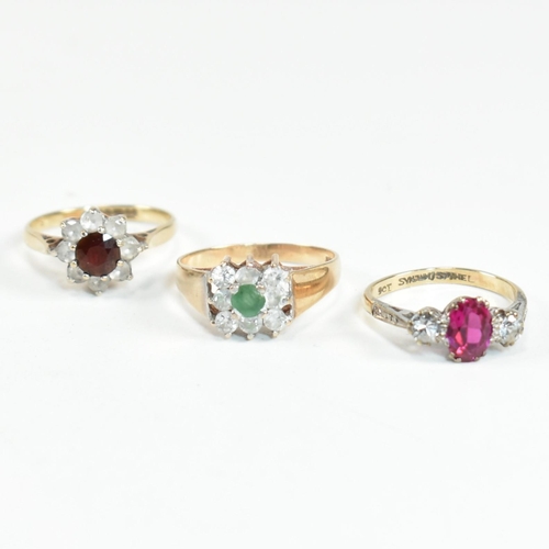 247 - Three 9ct gold and gem set rings. The rings to include a hallmarked 9ct gold, garnet and CZ cluster ... 