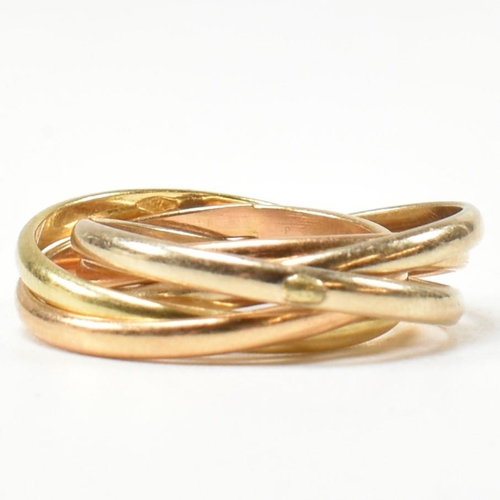 253 - An Italian 18ct gold five band puzzle ring. The ring formed with subtle graduating colours of gold. ... 