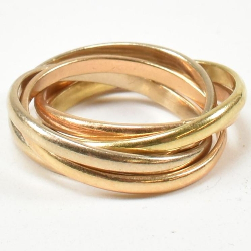 253 - An Italian 18ct gold five band puzzle ring. The ring formed with subtle graduating colours of gold. ... 