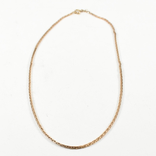 254 - A hallmarked 9ct gold foxtail chain necklace. The 9ct gold necklace having foxtail link to spring ri... 