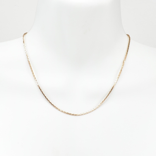 254 - A hallmarked 9ct gold foxtail chain necklace. The 9ct gold necklace having foxtail link to spring ri... 