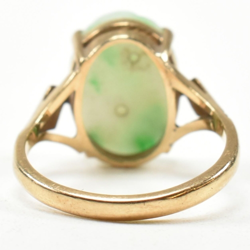 258 - A hallmarked 9ct gold and carved jade dress ring. Hallmarked for Birmingham. Size L.5. Weighs 3.3g. ... 