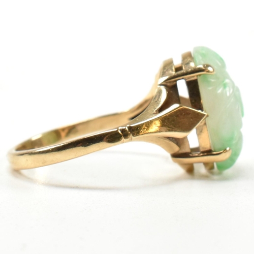 258 - A hallmarked 9ct gold and carved jade dress ring. Hallmarked for Birmingham. Size L.5. Weighs 3.3g. ... 