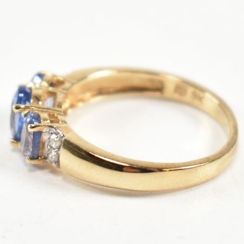 266 - A hallmarked 9ct gold, sapphire and diamond trilogy ring. The ring set with three graduating oval cu... 