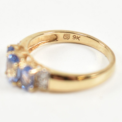 266 - A hallmarked 9ct gold, sapphire and diamond trilogy ring. The ring set with three graduating oval cu... 