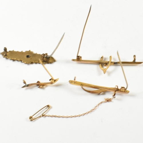 268 - A collection of antique 9ct gold and yellow metal brooch pins. The four brooches to include a hallma... 