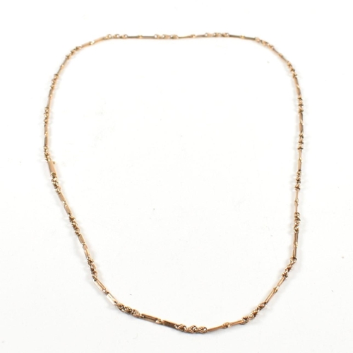 269 - A 9ct gold fancy twisted link chain necklace. The 9ct gold chain necklace having a barrel clasp. Mar... 