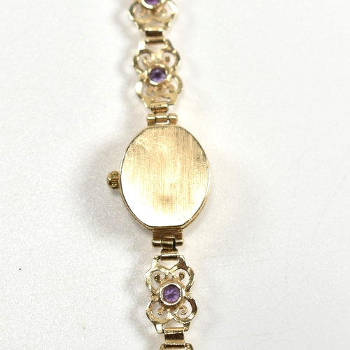 273 - A hallmarked 9ct gold Sovereign wristwatch set with purple stones. The Sovereign ladies wrist watch ... 