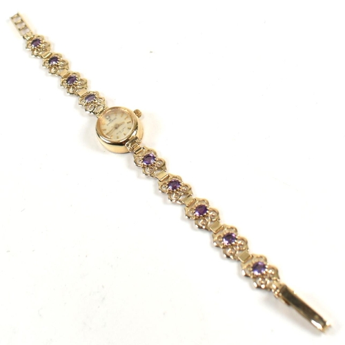 273 - A hallmarked 9ct gold Sovereign wristwatch set with purple stones. The Sovereign ladies wrist watch ... 