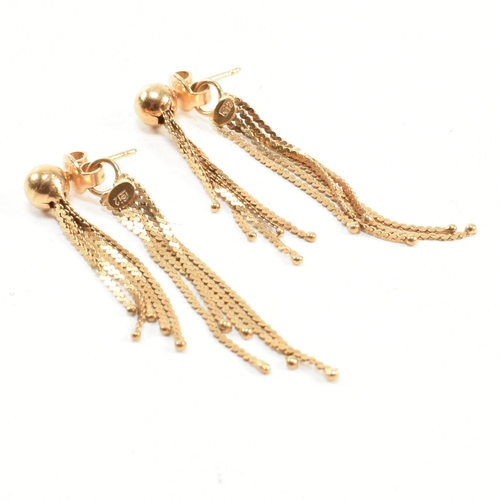 276 - A pair of 18ct gold tassel earrings. The earrings marked 750 with makers mark. Weight 4.8g. Measures... 