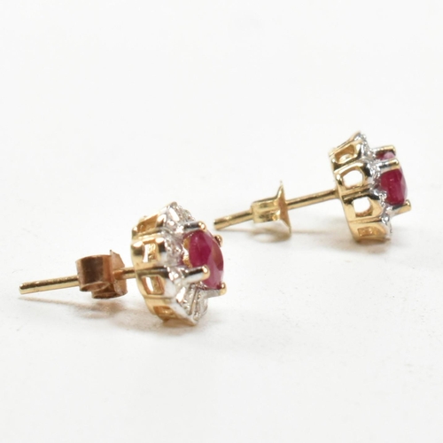 278 - A pair of 9ct gold, ruby and diamond cluster stud earrings. The 9ct gold stud earrings having a cent... 