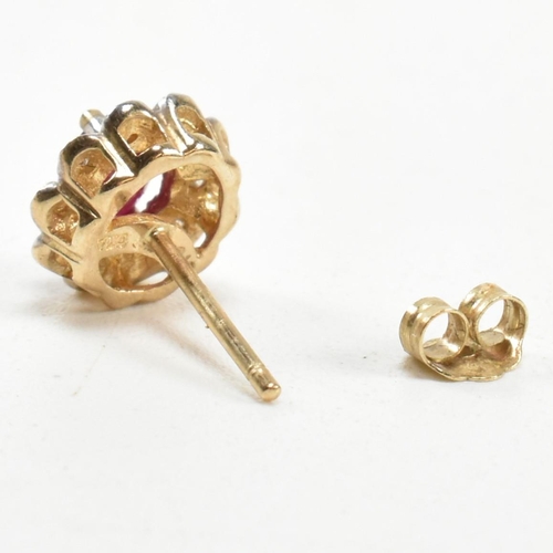 278 - A pair of 9ct gold, ruby and diamond cluster stud earrings. The 9ct gold stud earrings having a cent... 