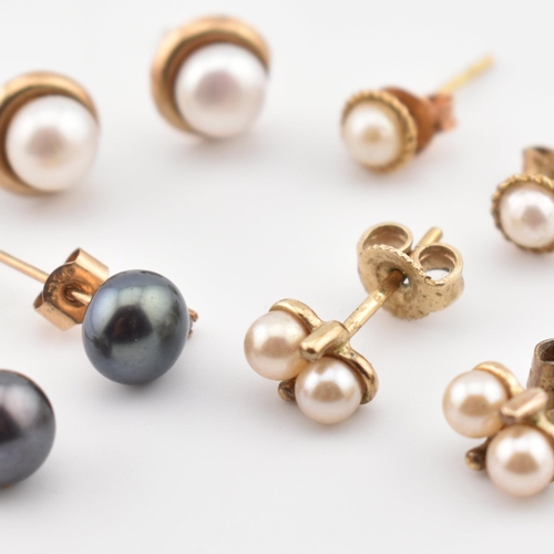 281 - Four pairs of 9ct gold and silver cultured pearl stud earrings. The earrings to include three pairs ... 