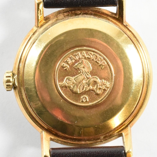 29 - 1960s 18ct gold Omega automatic Seamaster De Ville wristwatch. The watch having a gold face with bat... 