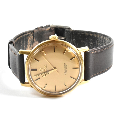 29 - 1960s 18ct gold Omega automatic Seamaster De Ville wristwatch. The watch having a gold face with bat... 