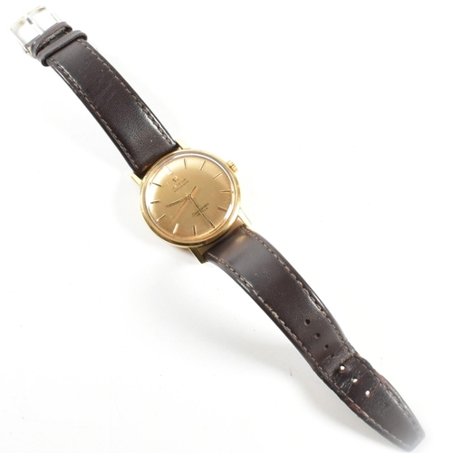 29 - 1960s 18ct gold Omega automatic Seamaster De Ville wristwatch. The watch having a gold face with bat... 