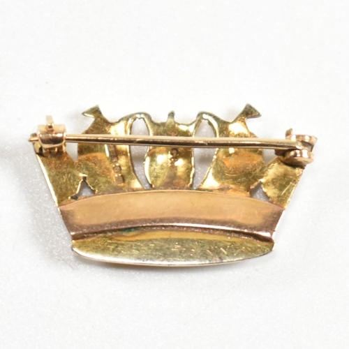 294 - A hallmarked 9ct gold, enamel and pearl crown brooch pin. The brooch pin in the shape of a crown hav... 