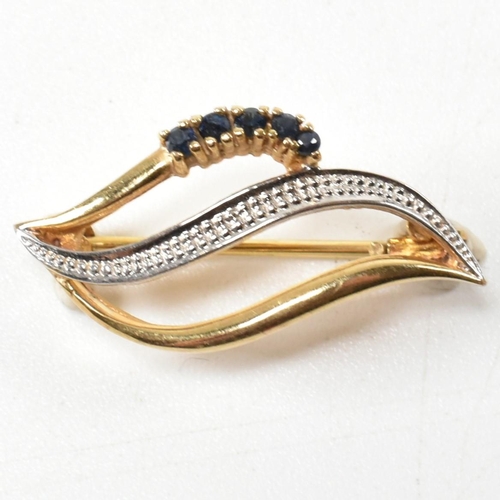 301 - A hallmarked 9ct gold sapphire brooch pin. The brooch in the form of a leaf set with round cut sapph... 