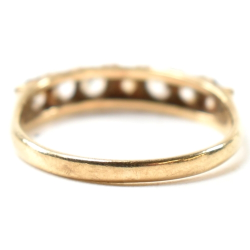 302 - A hallmarked 9ct gold and CZ half hoop ring. The 9ct gold ring having a single row of seven round cu... 