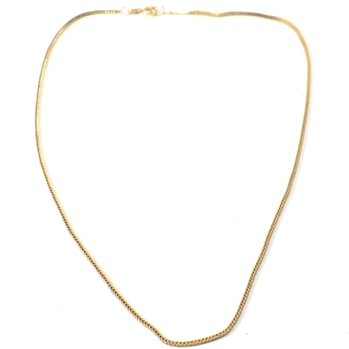 304 - A hallmarked 9ct gold foxtail chain necklace. The 9ct gold necklace having foxtail chain links to sp... 