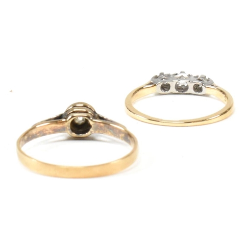 306 - Two 18ct gold, platinum and diamond rings. The rings to include an 18ct gold, platinum and diamond t... 