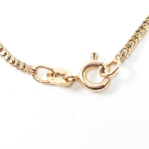 317 - A hallmarked 9ct gold foxtail chain necklace. The 9ct gold necklace having foxtail chain links to sp... 