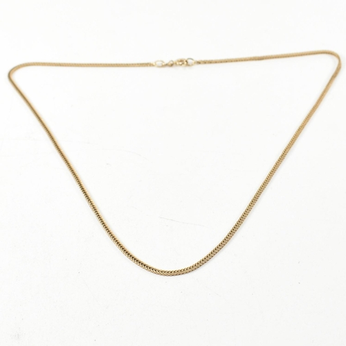 317 - A hallmarked 9ct gold foxtail chain necklace. The 9ct gold necklace having foxtail chain links to sp... 