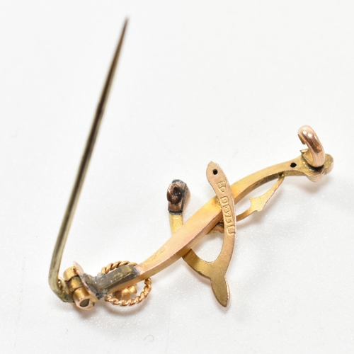 321 - Three hallmarked 9ct gold brooch pins. The brooch pins to include an Edwardian hallmarked 9ct gold b... 