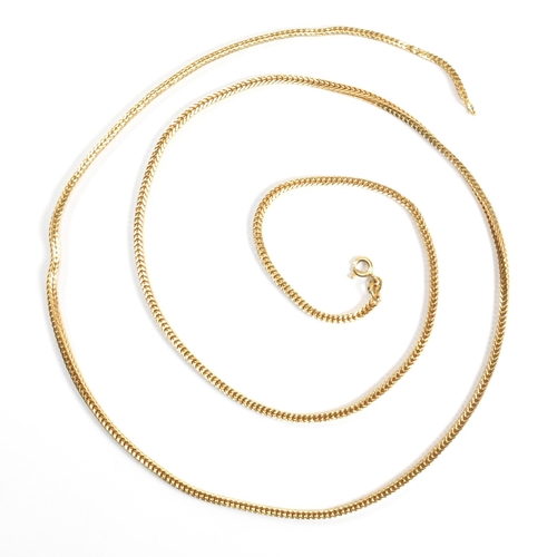 33 - An Italian 18ct gold chain necklace. The necklace formed with a box snake chain link to spring hoop ... 