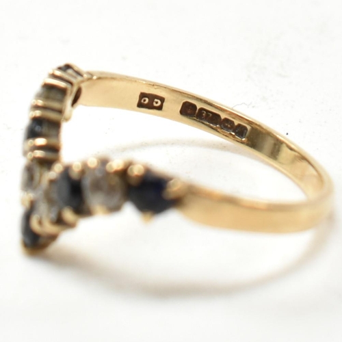 333 - A hallmarked 9ct gold St Christopher ring and two hallmarked 9ct gold and gem set rings. The lot to ... 