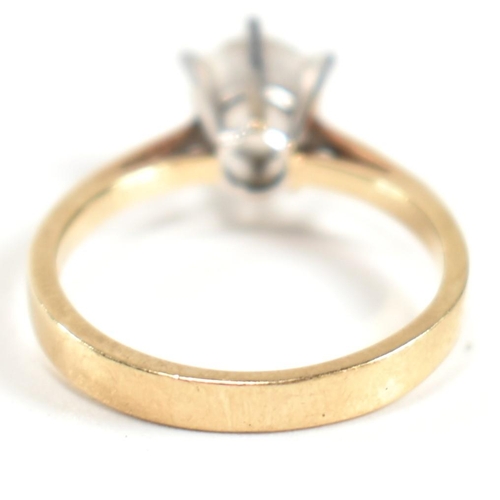 341 - A hallmarked 9ct gold and CZ solitaire ring. The ring set with a single six claw set round cut CZ to... 