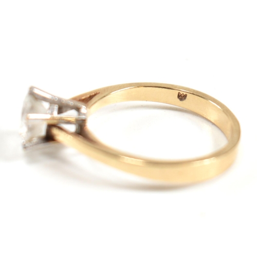 341 - A hallmarked 9ct gold and CZ solitaire ring. The ring set with a single six claw set round cut CZ to... 