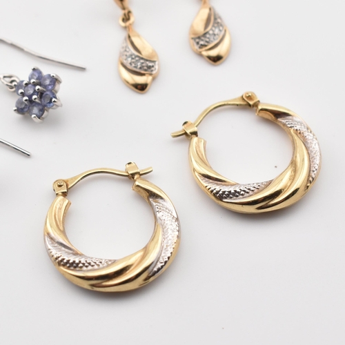 342 - Three pairs of 9ct gold and gem set earrings. The earrings to include a pair of 9ct two-tone gold tw... 