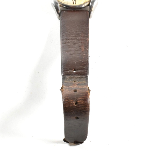 35 - A 1950s Rolex Precision gentleman's stainless steel wristwatch. The two piece case with swept down a... 