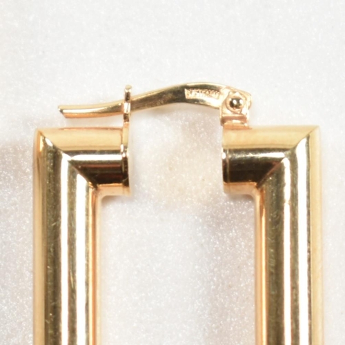 352 - A pair of hallmarked 9ct gold rectangular hoop earrings. The rectangular hoop earrings having a smoo... 