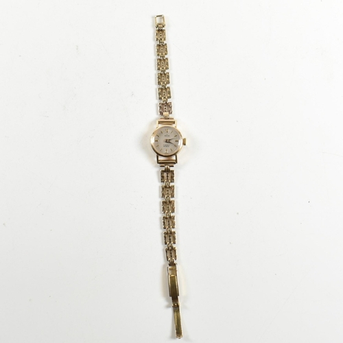 356 - A gold tone metal Smiths 17 jewels wristwatch. The watch having mixed Arabic and stick indices and a... 