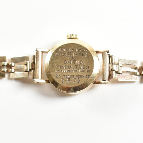 356 - A gold tone metal Smiths 17 jewels wristwatch. The watch having mixed Arabic and stick indices and a... 