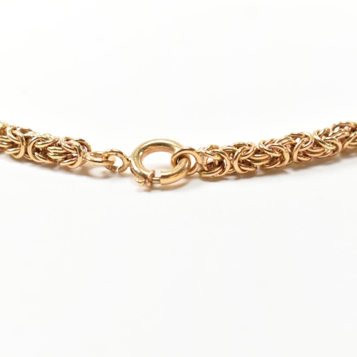 36 - A Portuguese 19.2ct gold byzantine chain necklace. The 19.2ct gold byzantine chain necklace having a... 