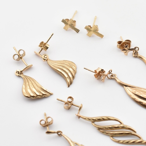 374 - Four pairs of 9ct gold earrings. The earrings to include a pair of cross stud earrings, marked 375 t... 