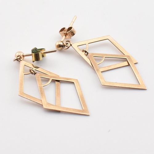 377 - A pair of hallmarked 9ct gold pendant earrings. The earrings having 9ct gold diamond shaped pendants... 